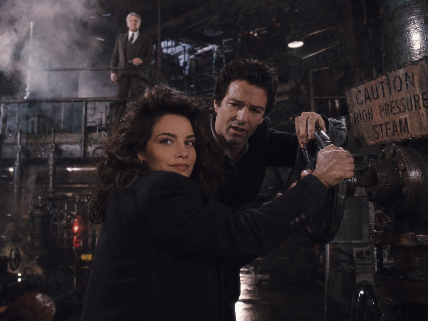 Nora and Jack force the pressure valve as Glass looms above